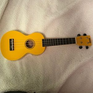 Yellow Mahalo Ukulele in great condition!